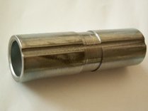 swingarm_grooved_spacer.jpg (11061 bytes)